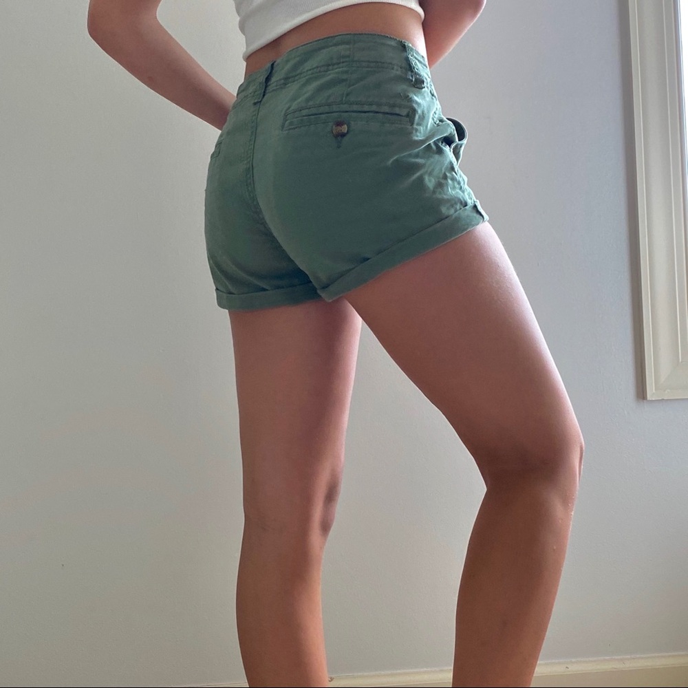 green stretchy american eagle shorts